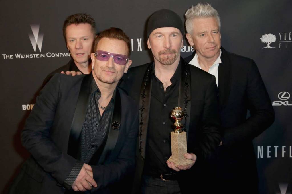 Integrantes do U2, Larry Mullen, Jr.,Bono, The Edge e Adam Clayton, em 2014 Integrantes do U2, Larry Mullen, Jr.,Bono, The Edge e Adam Clayton, em 2014